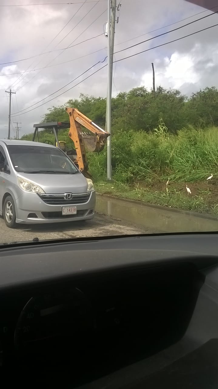 Preparing for the rain; cleaning out gutters